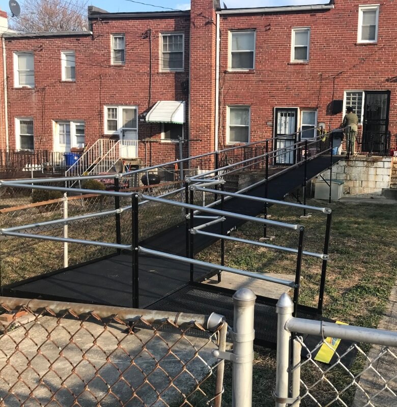This ramp purchase solved this family's problem getting a loved one to doctor's appointments. The front of the home had 3 sets of steps, and this solution took advantage of the backyard alley entrance. Don't be discouraged if your situation seems too big to solve. Call Greg Lazzaroni of Amramp Maryland today.