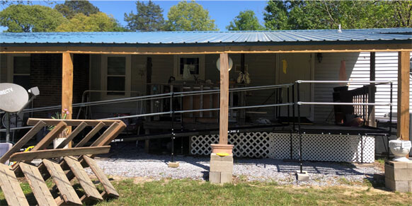 A ramp our Birmingham, AL installed to the deck of a customers home in Tallassee, AL