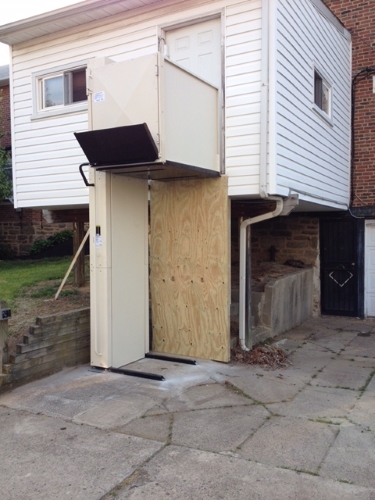 Nick Marcellino and the Amramp Philadelphia team added this room to the rear of this Philadelphia, PA and included a vertical platform lift to provide wheelchair access to the rear driveway.