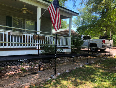 Amramp of Birmingham, AL installed this wheelchair ramp over a set of preexisting set of stairs for a customer located in Clanton, AL.